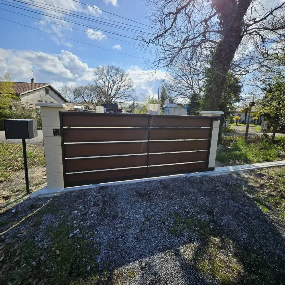 Fabrication et pose de portail coulissant en acier corten sur mesure à La Teste-de-Buch (4)webp