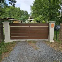 Fabrication et pose de portail coulissant en acier corten sur mesure à La Teste-de-Buch (1)webp